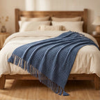 Navy Ridley Knitted Throw Blanket with Tassels lifestyle photo