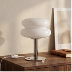 Beige lamp styled in a warm home setting