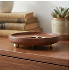 Brass ball A wooden tray styled in a warm home setting - 3