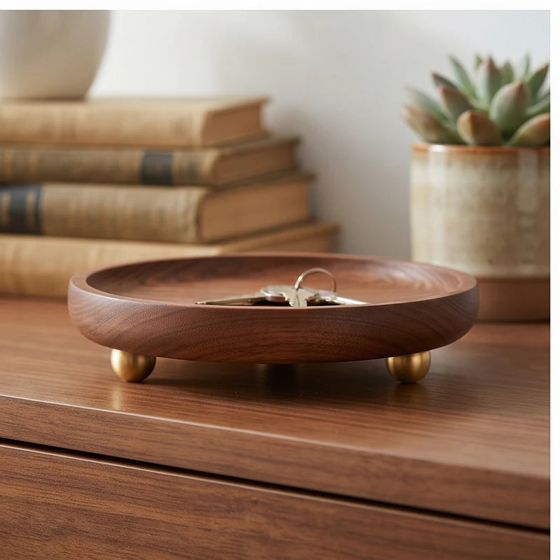 Brass ball A wooden tray styled in a warm home setting - 3
