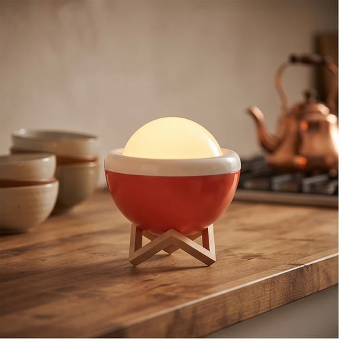 Orange lamp styled in a warm home setting