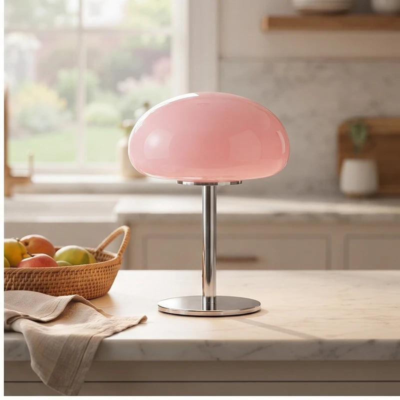 Pink glass lamp styled in a warm home setting - 2