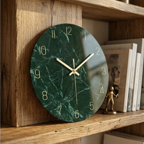 Green marble tempered glass wall clock with gold hands, modern style.
