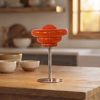 Orange lamp styled in a warm home setting