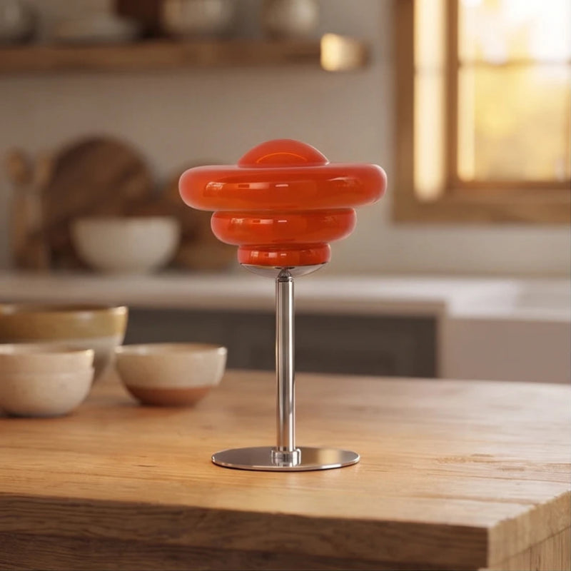Orange lamp styled in a warm home setting