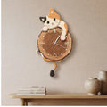 tabby cat clock styled in a warm home setting