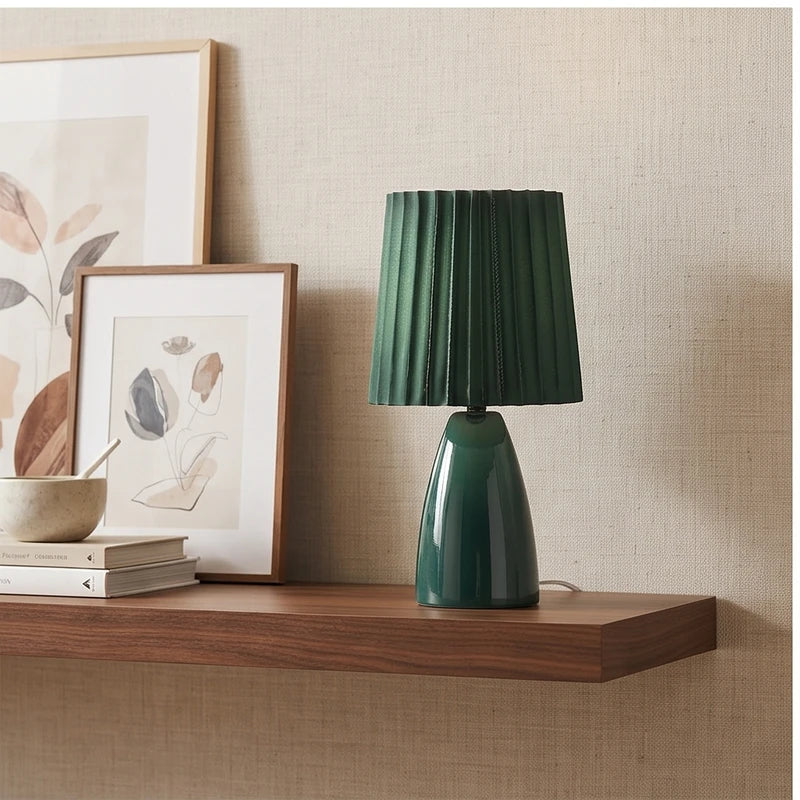 Green ceramic lamp styled in a warm home setting - 2