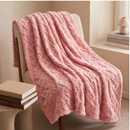 Pink fleece throw styled in a warm home setting - 2