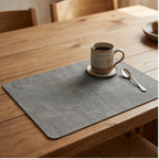 Dark Gray Dual-Sided PU Canvas Texture Placemat,Waterproof Heatproof 43x30cm Non-Slip Dining Table Mat,Washable for Home and Hotel Use lifestyle photo