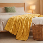 Yellow fleece throw styled in a warm home setting - 2