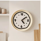 Black clock styled in a warm home setting - 3