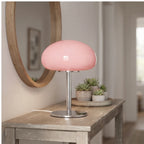 Pink glass lamp styled in a warm home setting - 4