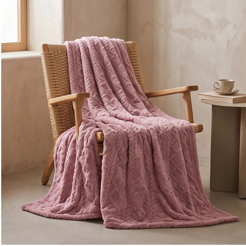Purple fleece throw styled in a warm home setting
