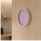 Purple clock styled in a warm home setting