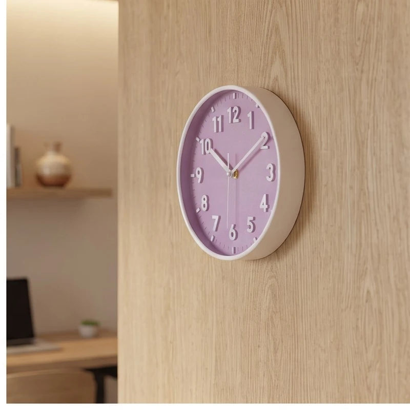 Purple clock styled in a warm home setting
