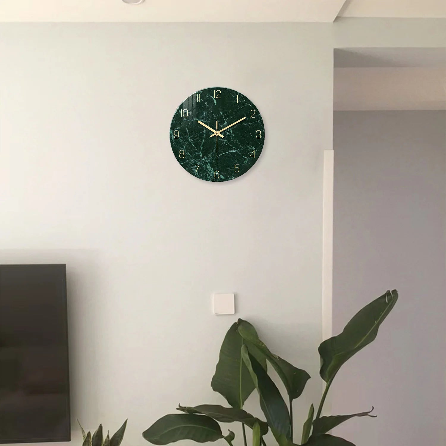 Green marble tempered glass wall clock with gold hands.