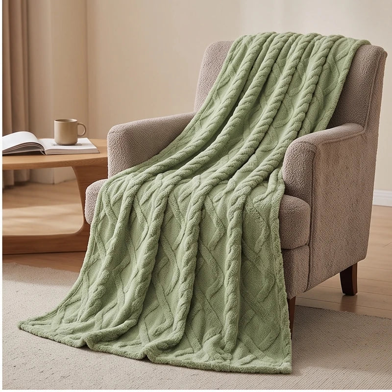 Green fleece blanket styled in a warm home setting - 2