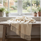 Cream Ashlar Knitted Throw Blanket with Tassels lifestyle photo - 2