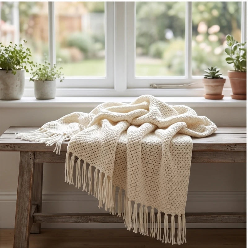 Cream Ashlar Knitted Throw Blanket with Tassels lifestyle photo - 2