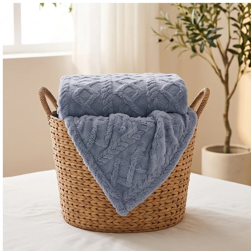 Blue fleece throw styled in a warm home setting - 3