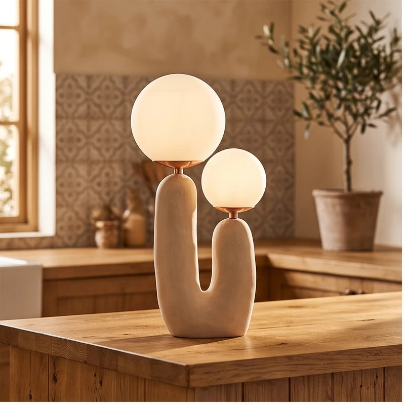 Pink lamp styled in a warm home setting