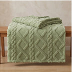 Green fleece blanket styled in a warm home setting - 3
