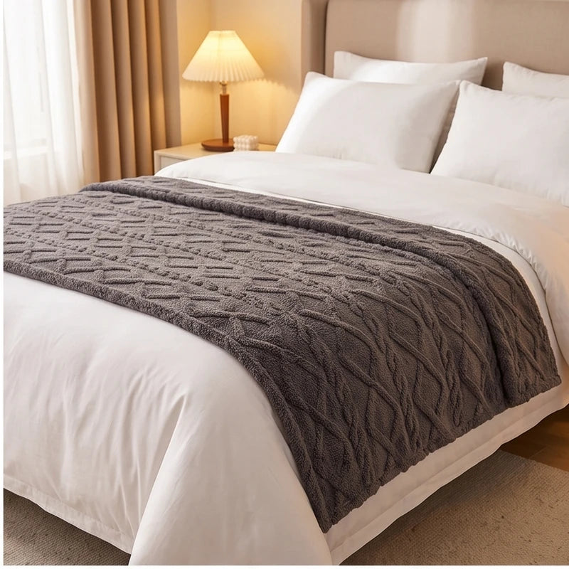 Gray fleece blanket styled in a warm home setting - 2