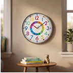 Silver clock styled in a warm home setting