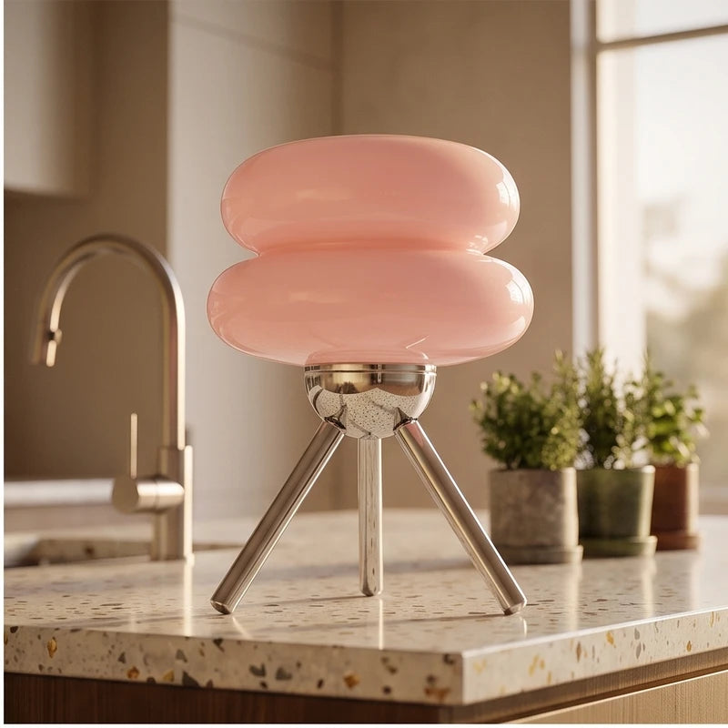 Pink lamp styled in a warm home setting