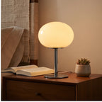 Creamy Custard Oval lamp styled in a warm home setting - 2