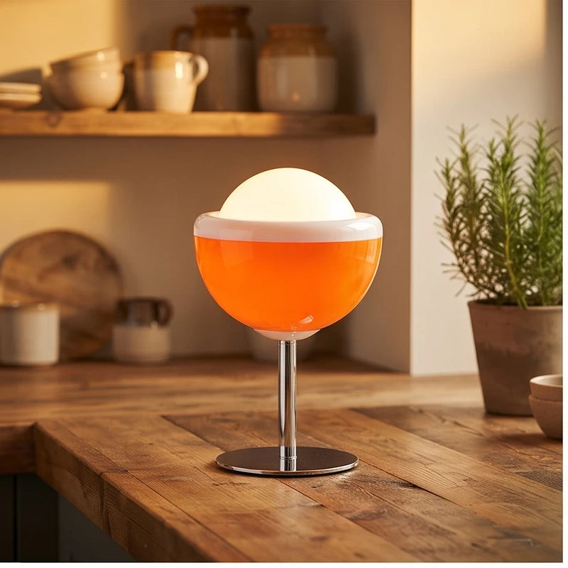 Orange lamp styled in a warm home setting