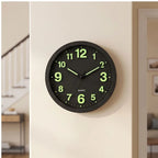 Black clock styled in a warm home setting - 2
