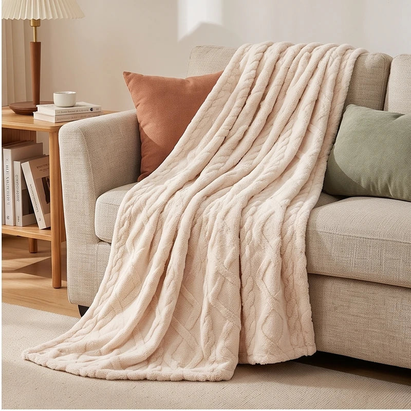 White fleece blanket styled in a warm home setting