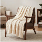 White fleece throw styled in a warm home setting - 2