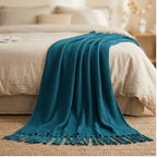 Navy Ashlar Knitted Throw Blanket with Tassels lifestyle photo