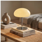 Cream glass lamp styled in a warm home setting - 4