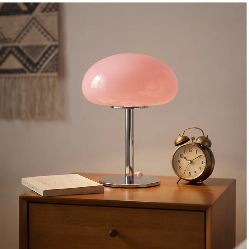 Pink glass lamp styled in a warm home setting - 3
