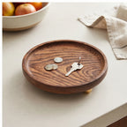 Brass ball A wooden tray styled in a warm home setting - 4